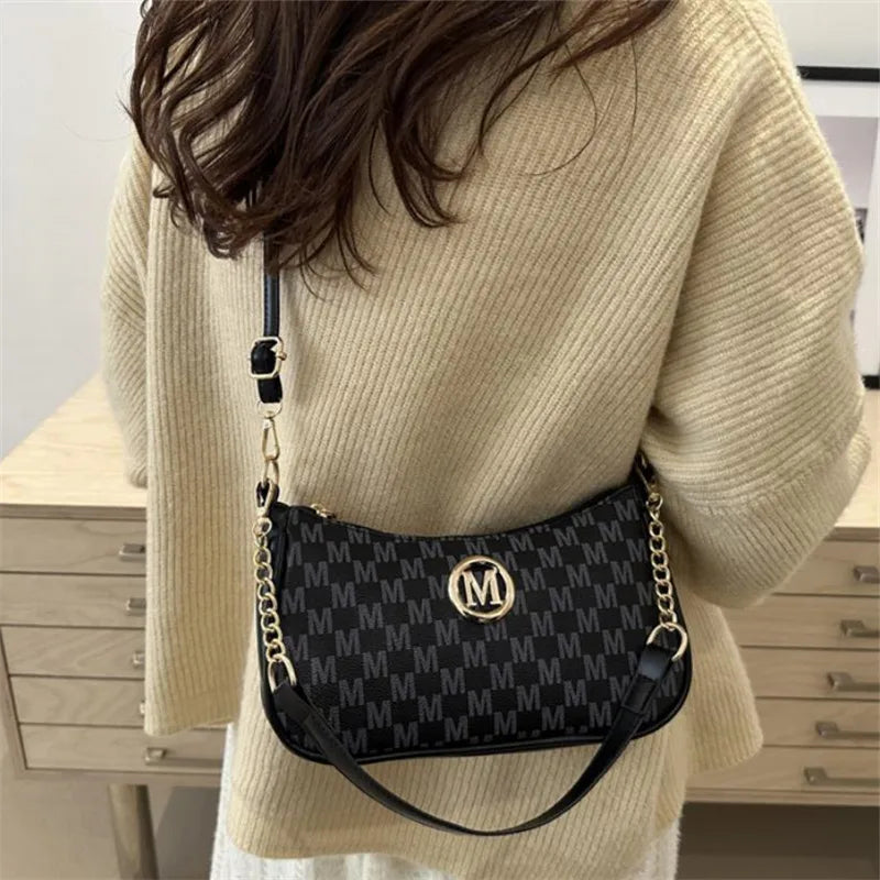 Chic Crossbody Handbag with Gold Accent