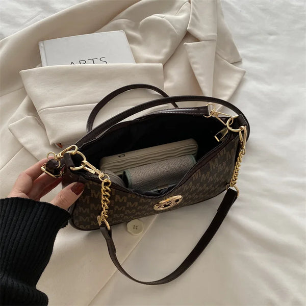 Chic Crossbody Handbag with Gold Accent