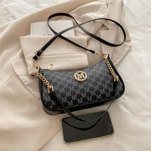 Chic Crossbody Handbag with Gold Accent