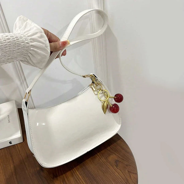 Women-s-PU-Leather-Handbag-Versatile-Fashion-Solid-Color-Cherry-Pendant-Shoulder-Bag-Casual-Commuting-Bag.jpg